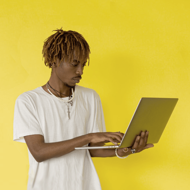 young man with laptop