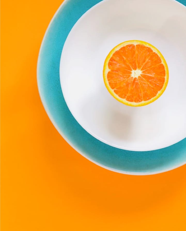 sliced orange on dish